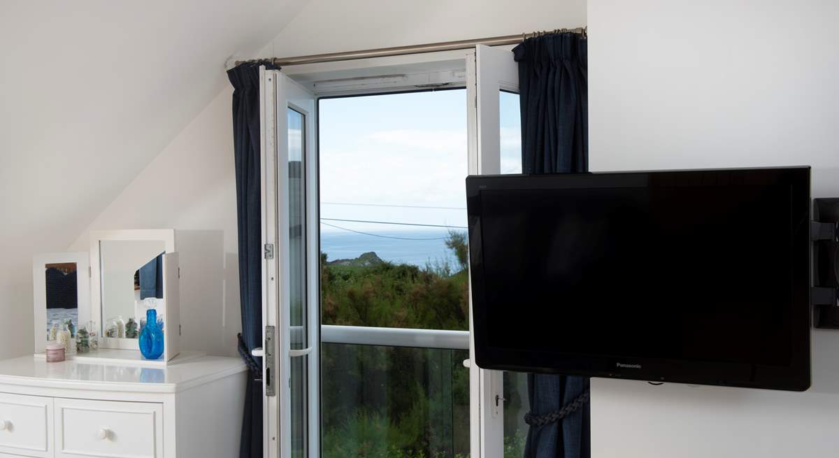 Glimpse the ocean from bedroom 4.