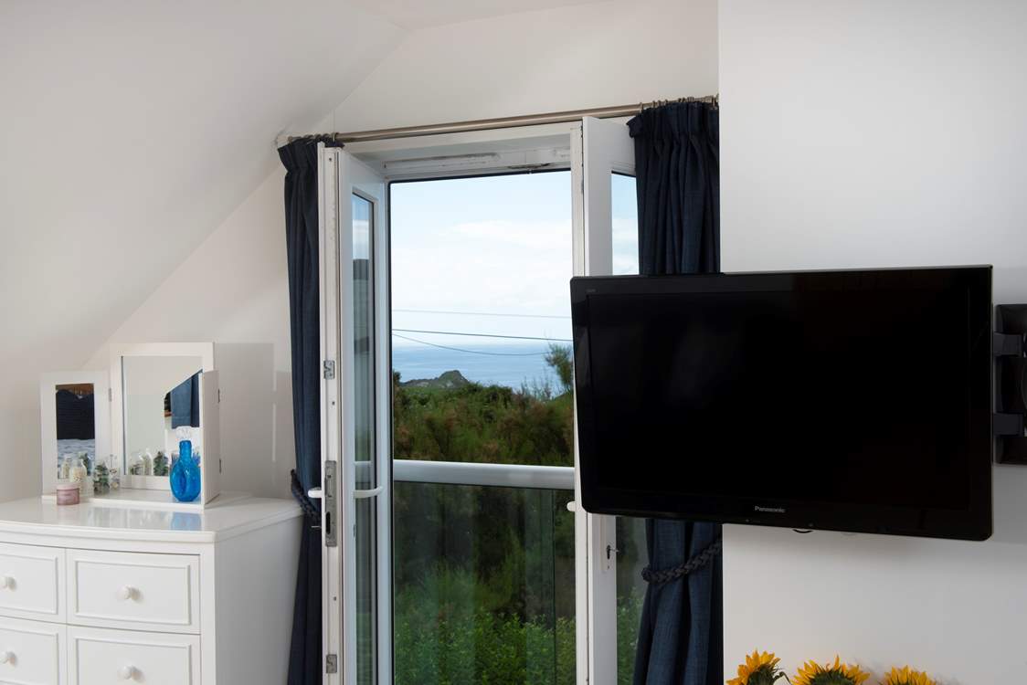 Glimpse the ocean from bedroom 4.