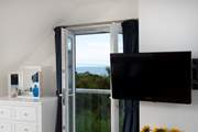 Glimpse the ocean from bedroom 4.