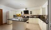 The kitchen is spacious and filled with light. - Thumbnail Image