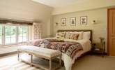 The main bedroom with Emperor bed (6' 6'' wide) is a relaxing haven. - Thumbnail Image