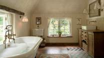 The en suite has a gorgeous free-standing bath.