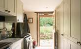 The utility-room with door that leads to the garden, where just outside you will find a useful shower to hose down muddy dogs and wellies.
 - Thumbnail Image