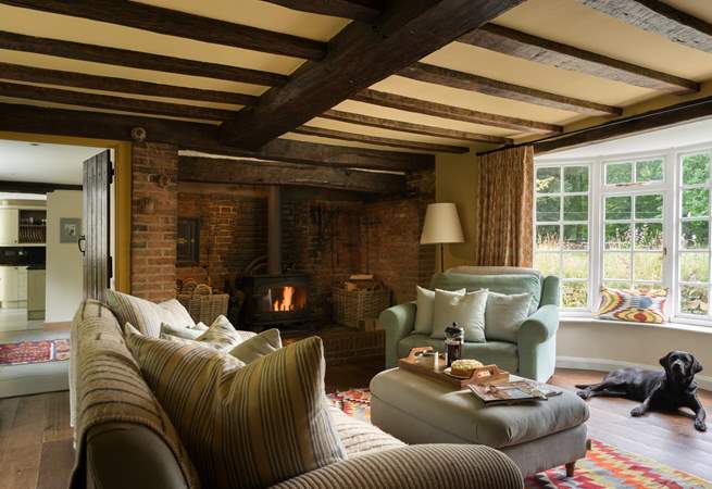 The sitting-room is bursting with character and has an inglenook fireplace with wood-burning stove for those chilly afternoons or evenings.