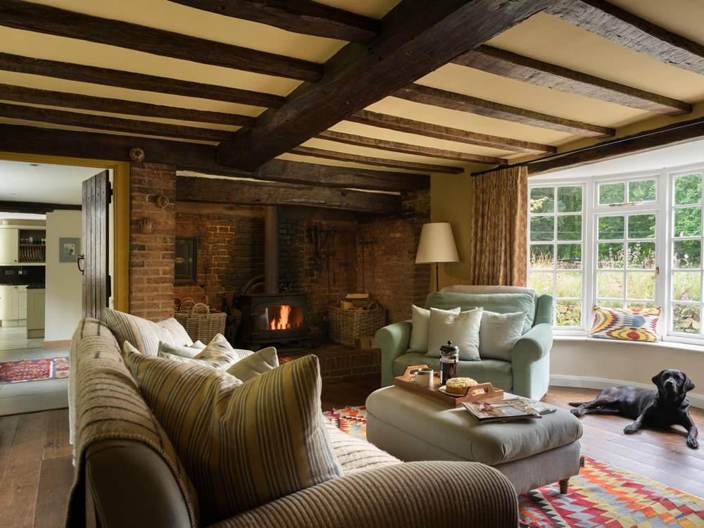 The sitting-room is bursting with character and has an inglenook fireplace with wood-burning stove for those chilly afternoons or evenings.