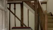 As you step through the main door, you are greeted by this wonderful oak staircase.