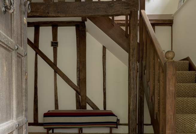 As you step through the main door, you are greeted by this wonderful oak staircase.