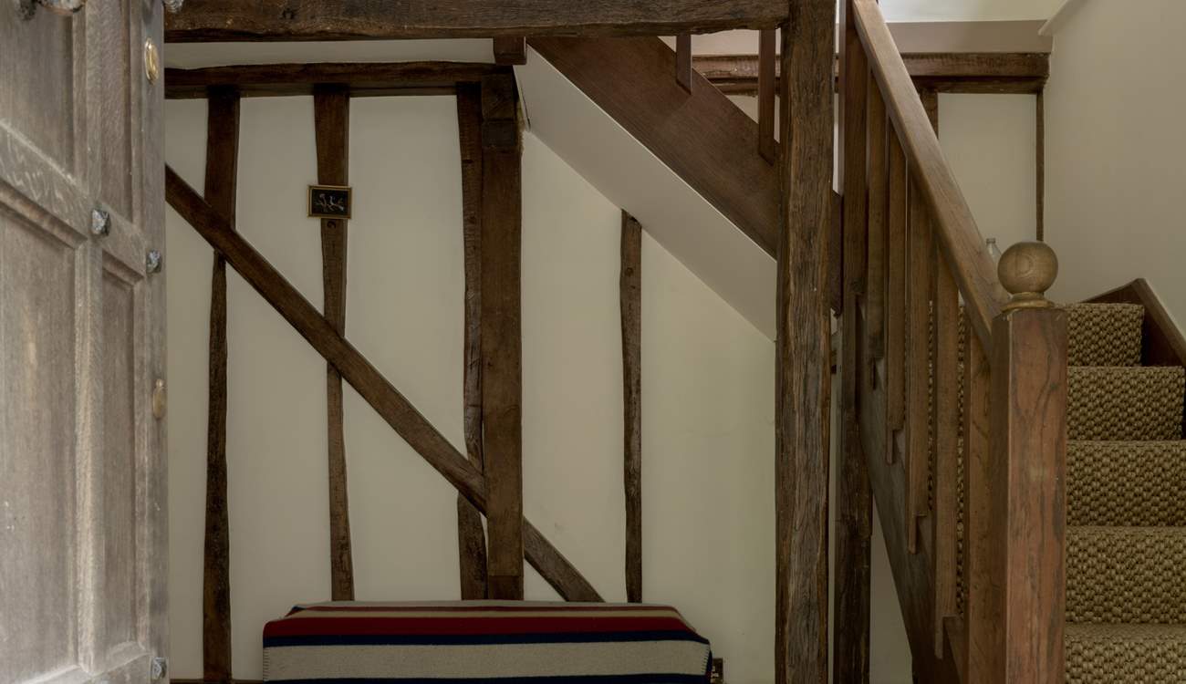 As you step through the main door, you are greeted by this wonderful oak staircase.