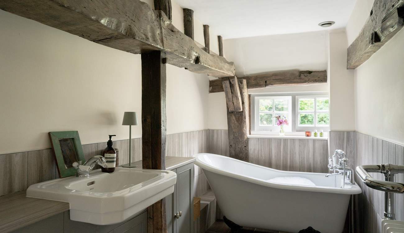 The family bathroom has a beautiful Victorian roll-top bath.