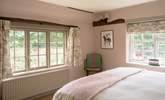 All the bedrooms are dressed in beautiful linens. - Thumbnail Image