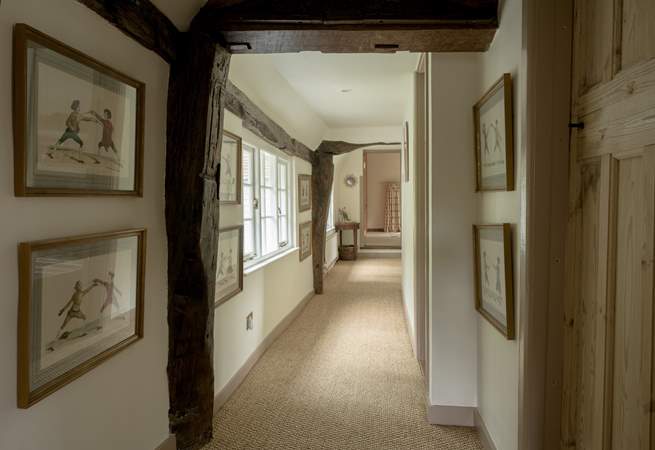 Please note there are a couple of the beams upstairs along the hallway that are a little low.