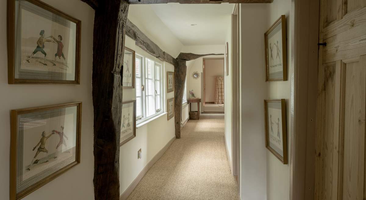 Please note there are a couple of the beams upstairs along the hallway that are a little low.