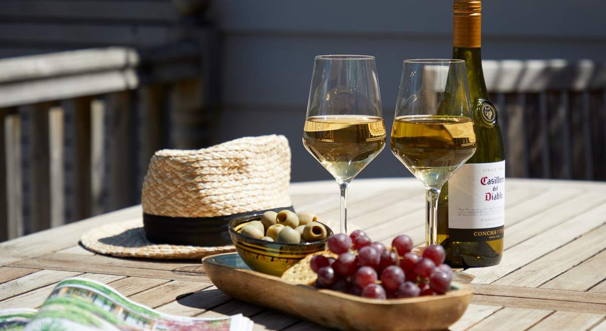 Sit back and enjoy a drink in the Island sunshine.