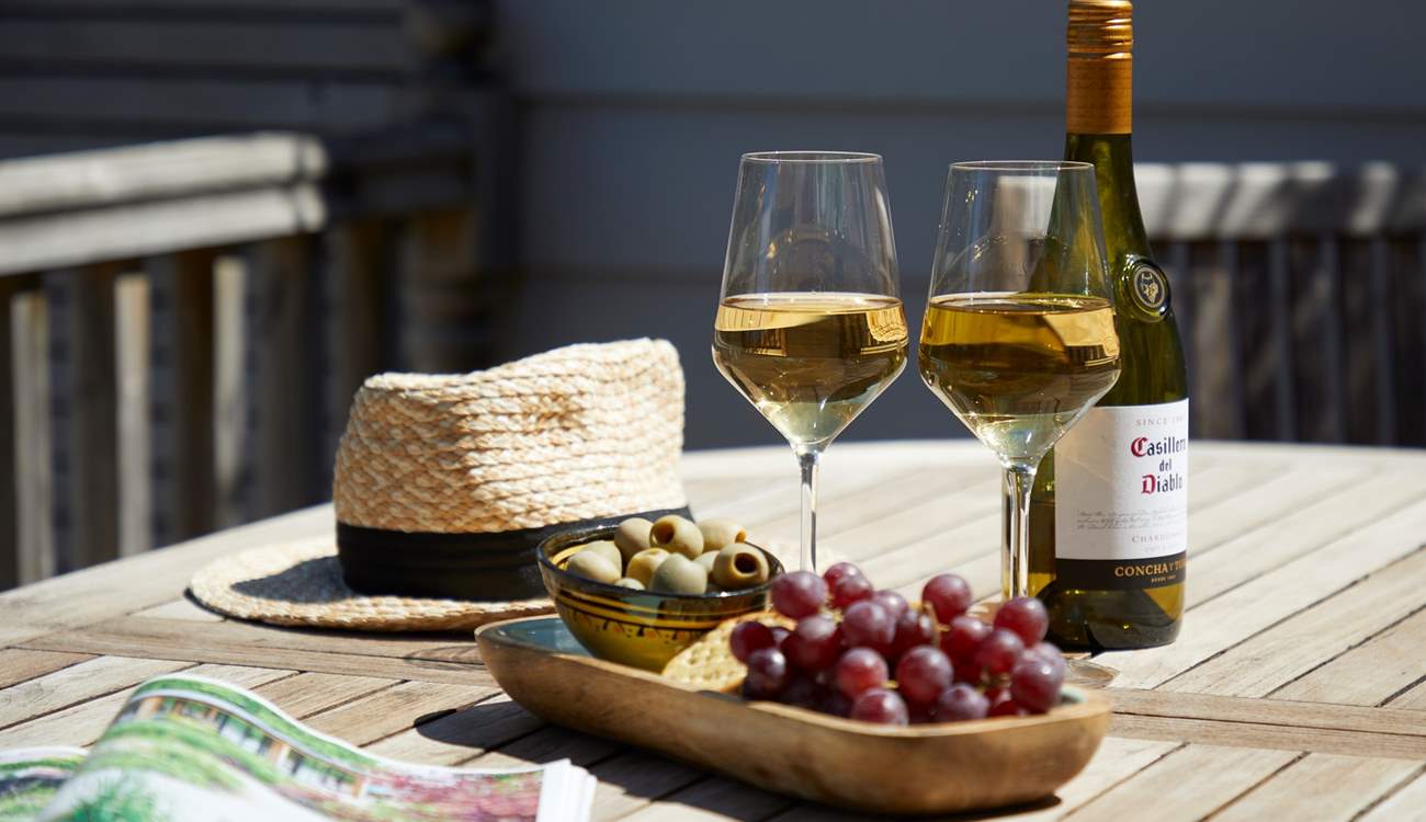 Sit back and enjoy a drink in the Island sunshine.