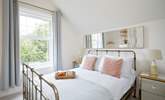 Bedroom 1 is located at the rear of the property and overlooks the courtyard. - Thumbnail Image