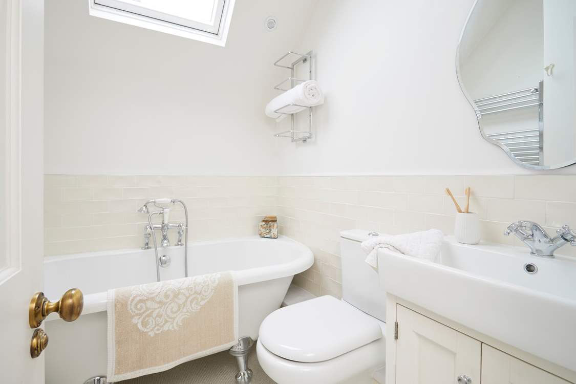 Enjoy a relaxing soak in the en suite bathroom to bedroom 1.