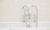Traditional touches create an elegant feel. - Thumbnail Image