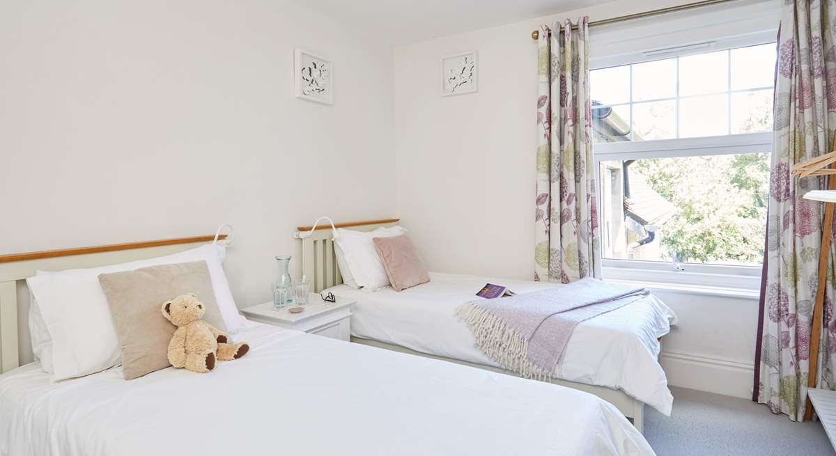 Bedroom 2 is a stylish twin bedroom...