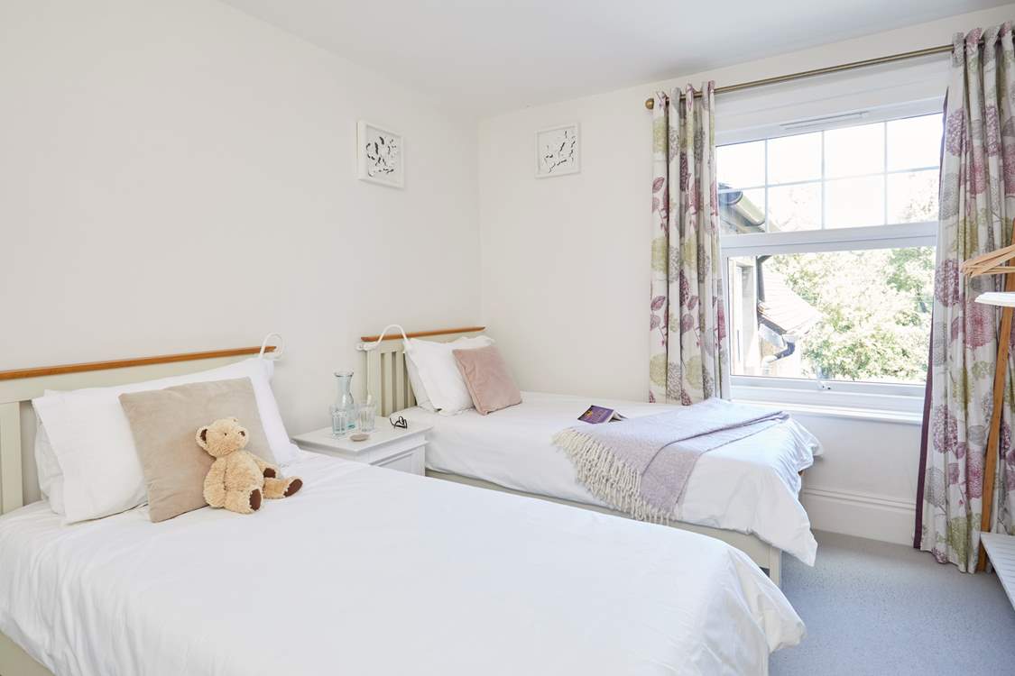 Bedroom 2 is a stylish twin bedroom...