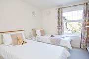 Bedroom 2 is a stylish twin bedroom...