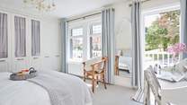 Bedroom 3 with super-king bed - the perfect retreat for some rest and relaxation! Please note, access to the balcony is for emergency use only.