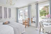 Bedroom 3 with super-king bed - the perfect retreat for some rest and relaxation! Please note, access to the balcony is for emergency use only.
