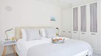 You will be sure to get a good night's sleep here with fresh crisp linen and a comfortable bed.