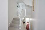 The first floor has a split level with three steps.