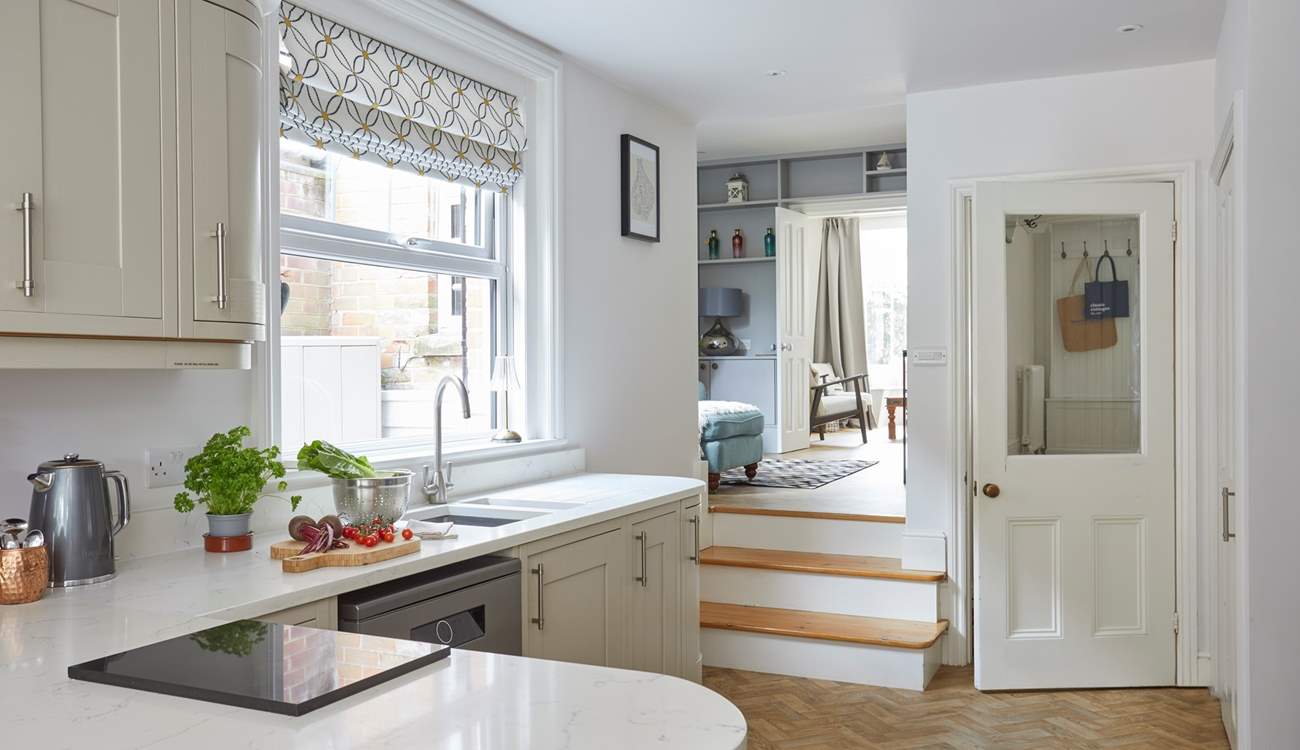 Step up from the kitchen into the cosy split-level snug for a movie of your choice.