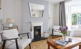 Take some time out and enjoy a good book in the stunning sitting-room. - Thumbnail Image