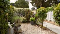 Charming front garden details capture the elegant essence of Maybury. 