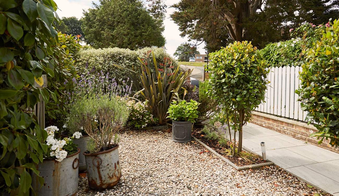 Charming front garden details capture the elegant essence of Maybury. 