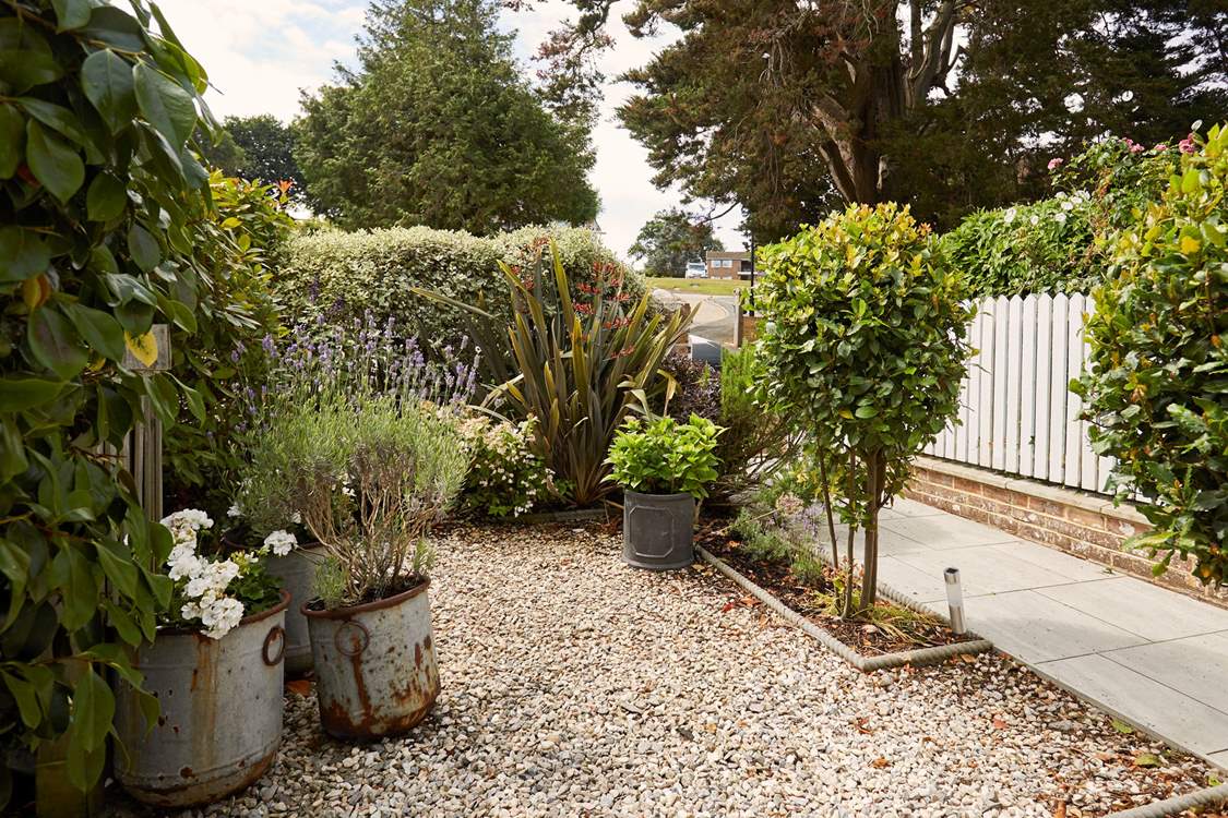 Charming front garden details capture the elegant essence of Maybury.