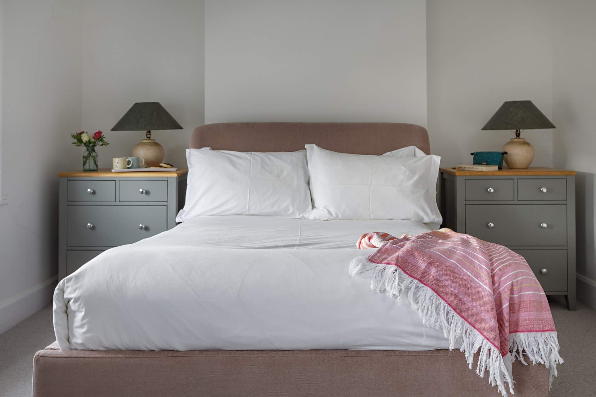 Lovely linens in the stylish light-filled front bedroom.