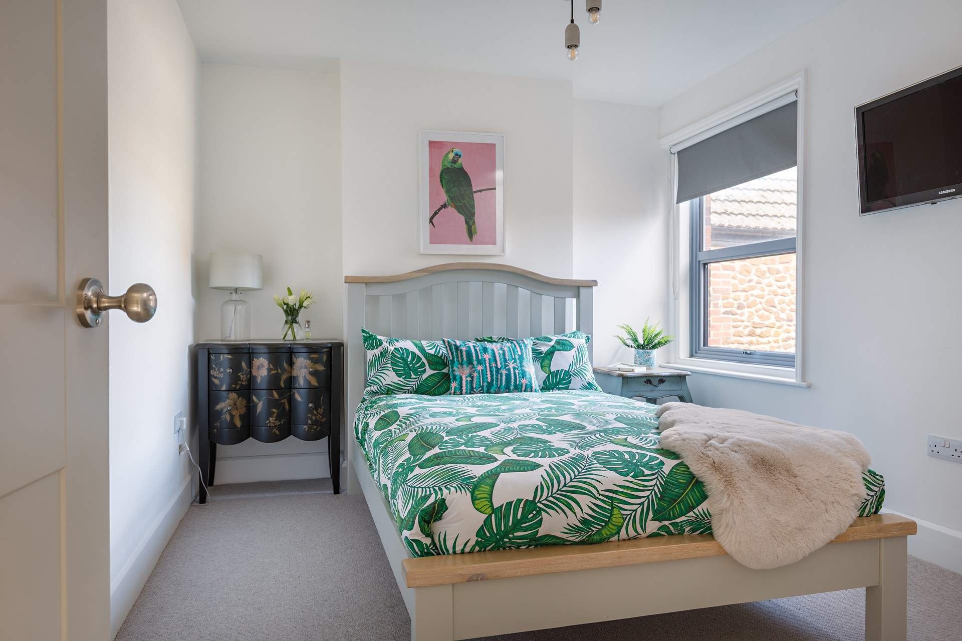 Another light-filled double bedroom.