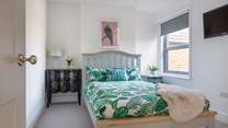 Another light-filled double bedroom.