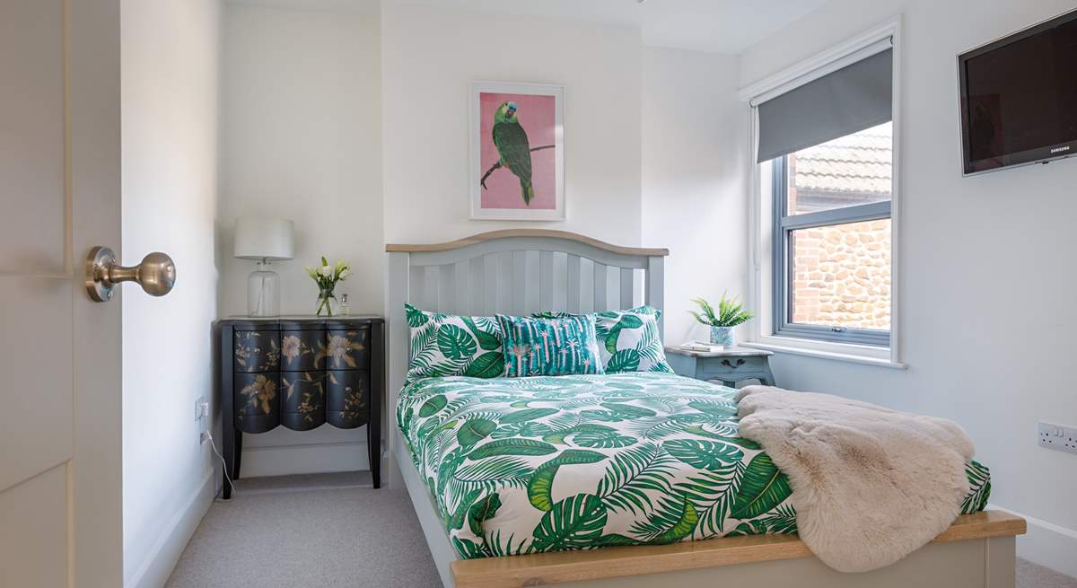 Another light-filled double bedroom.