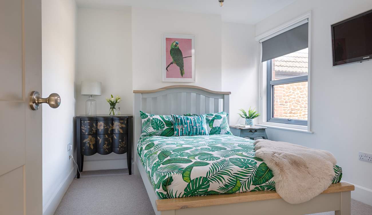 Another light-filled double bedroom.
