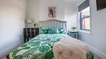 This double bedroom is super comfy and light and airy.