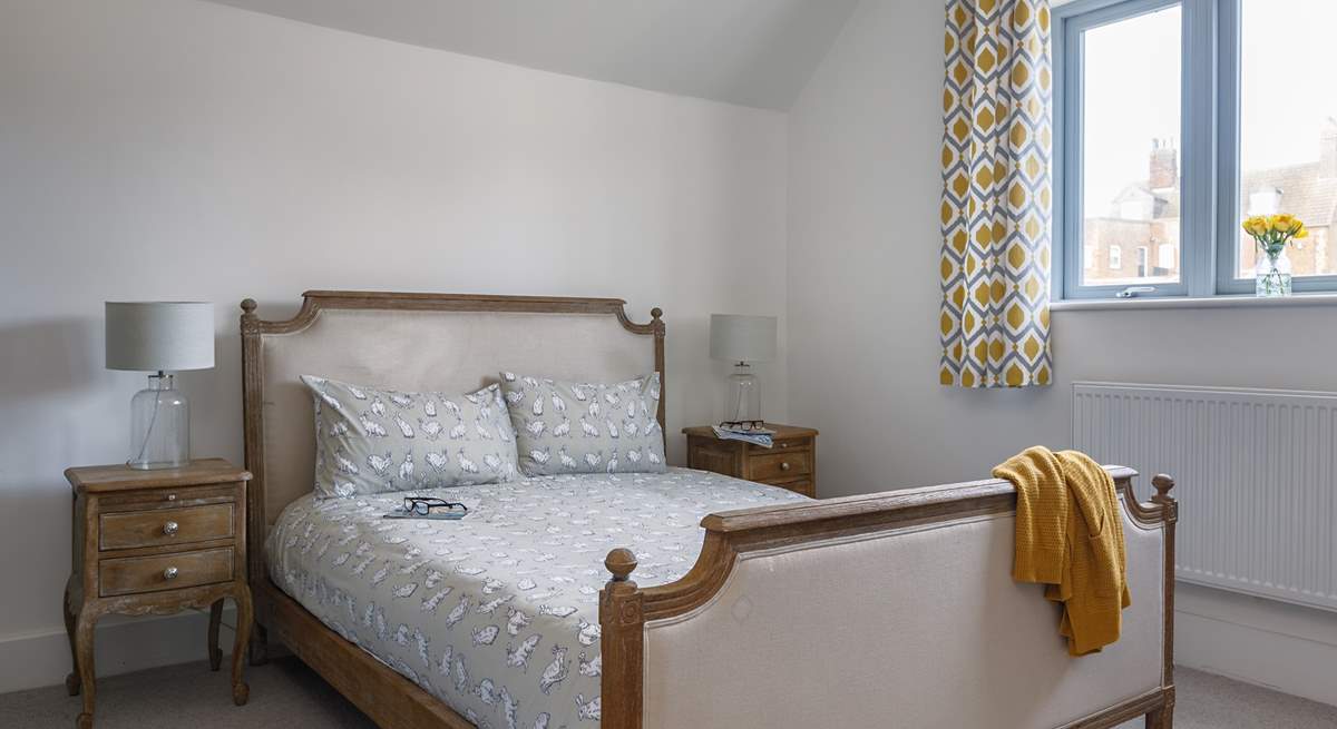 The rear double bedrooms has views of the garden.