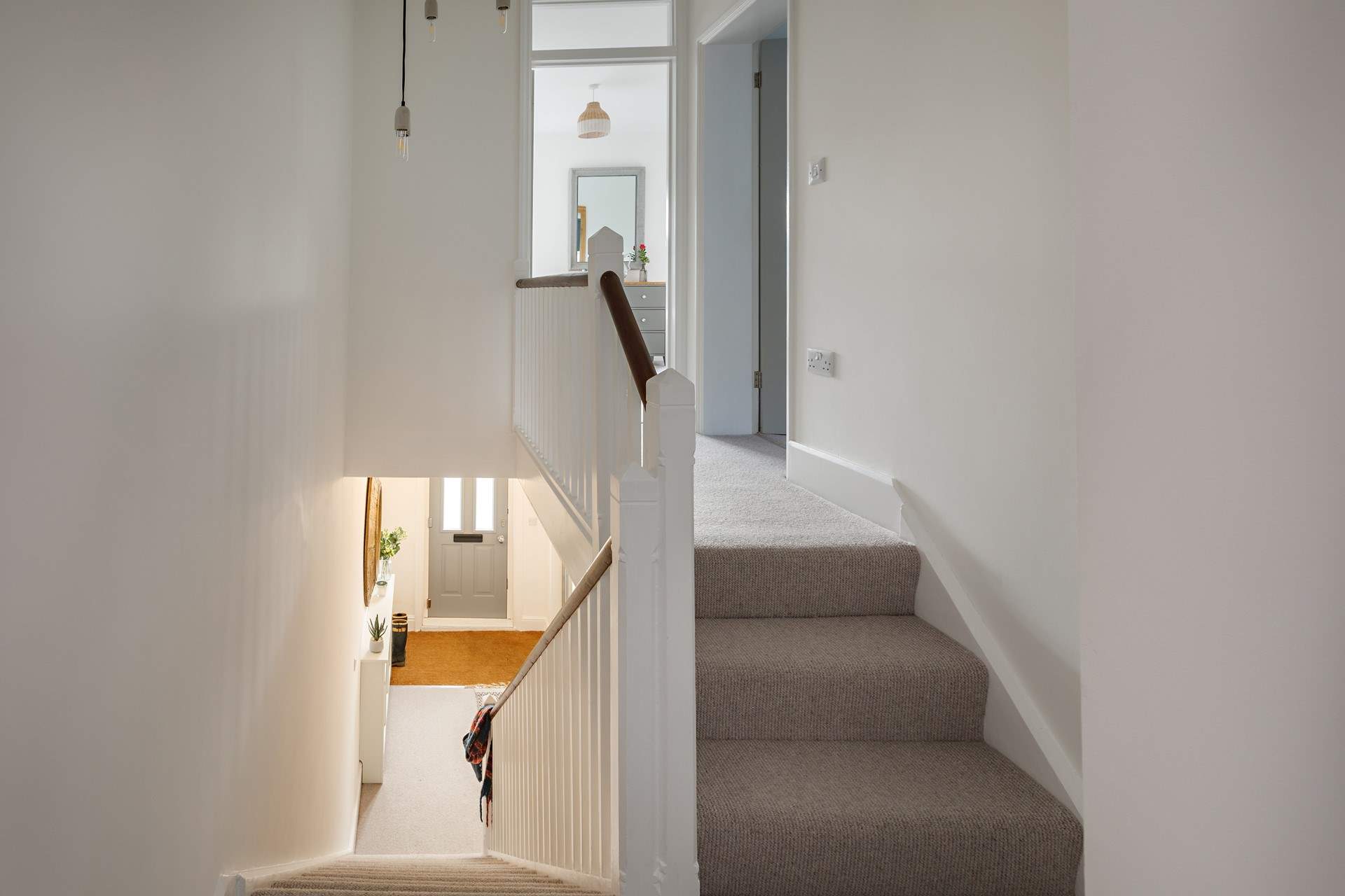 Climb the steps to the light-filled bedrooms.