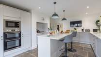 Pre-dinner drinks in the gorgeous kitchen, great for catching up with dear friends.