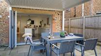 Dine outdoors rain or shine with the perfect canopy overhead.