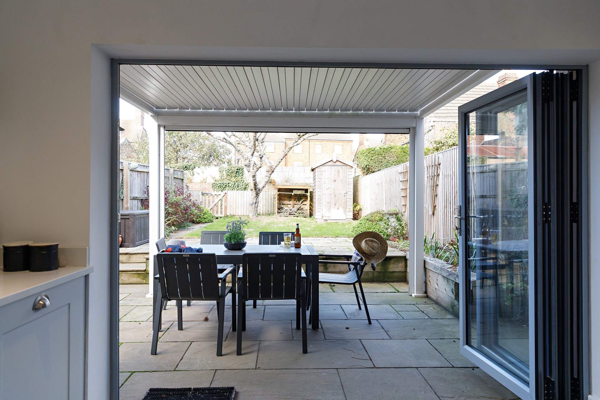 Enjoy the covered terrace with easy access from the kitchen.