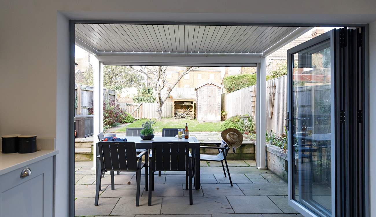 Enjoy the covered terrace with easy access from the kitchen.