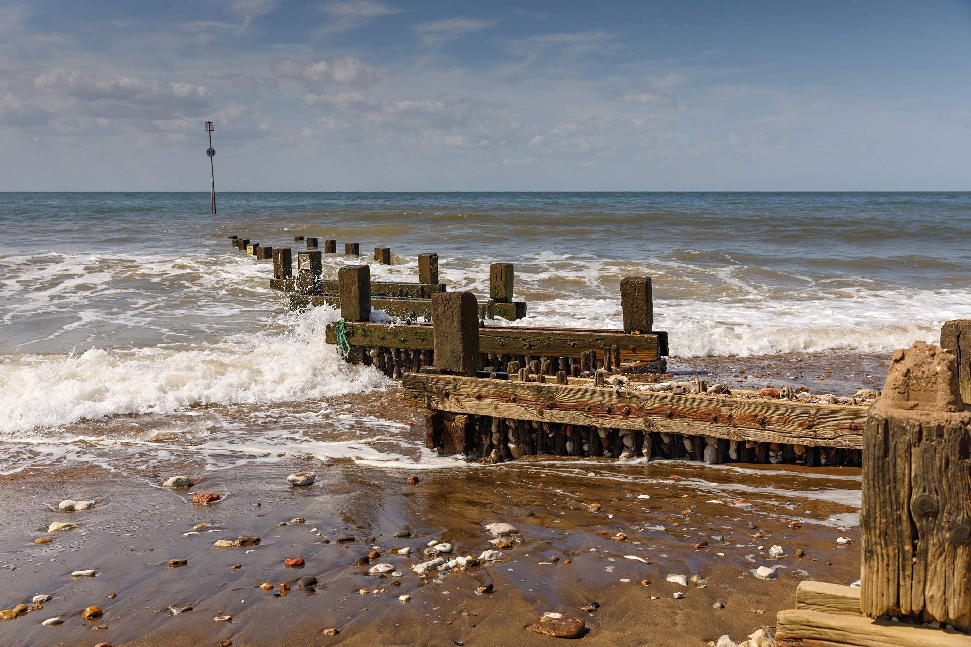 Enjoy the vista of Hunstanton's shoreline, renowned for spectacular sunsets.