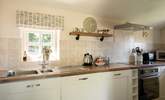 Sweet, well-equipped cottage kitchen. - Thumbnail Image
