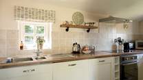 Sweet, well-equipped cottage kitchen.