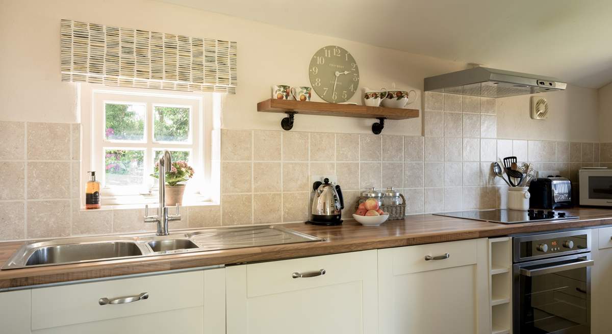 Sweet, well-equipped cottage kitchen.