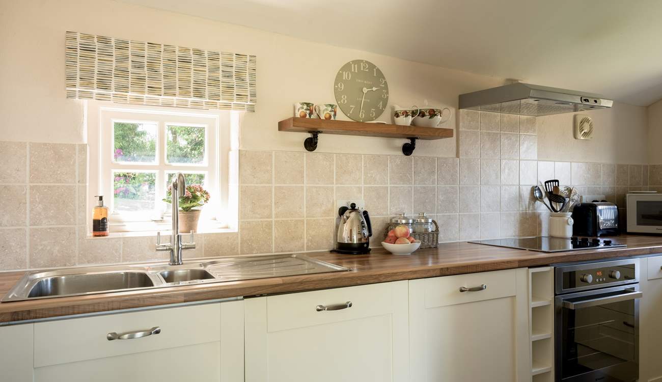 Sweet, well-equipped cottage kitchen.